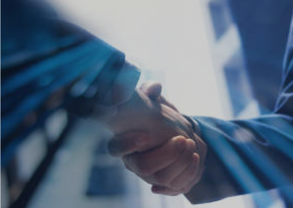 Handshake between professionals symbolizing strategic partnership